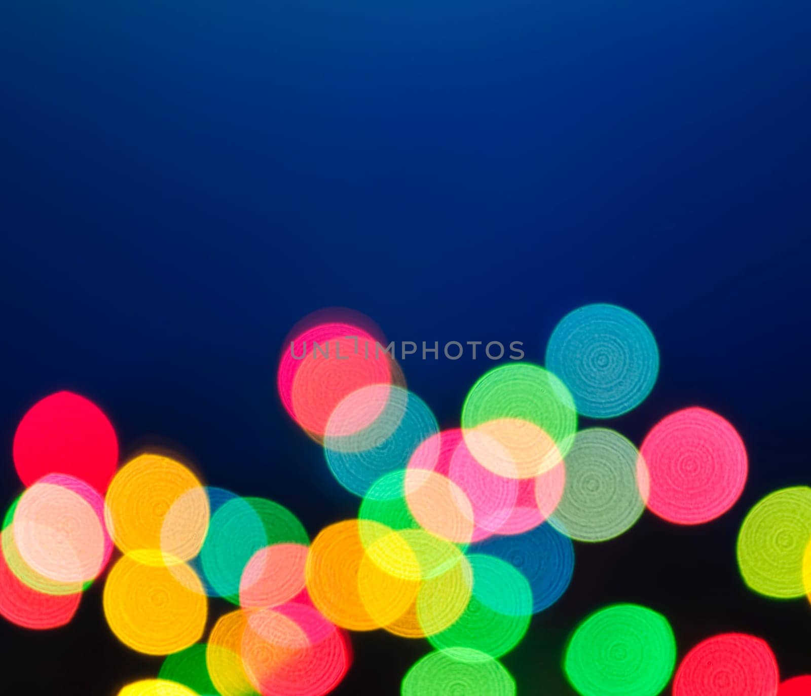 Out of focus multicolored Christmas light background
