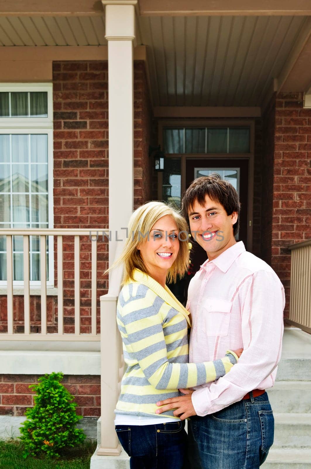 Young happy couple in love at home