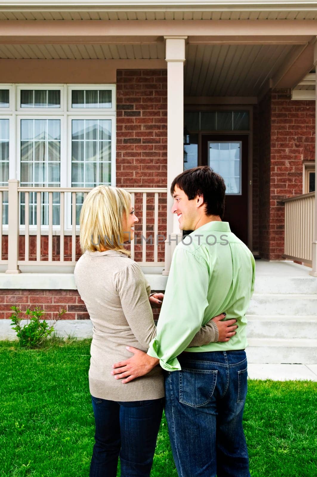 Young happy couple in love at home