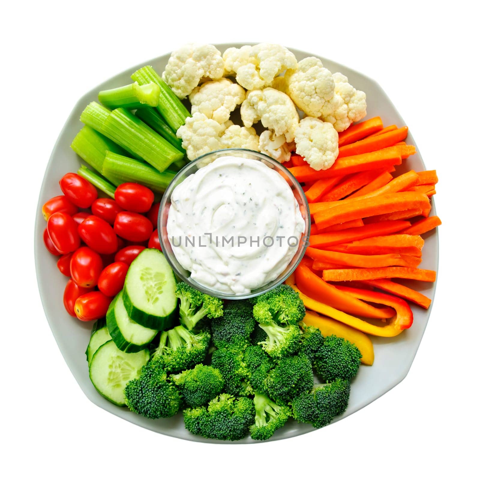 Platter of assorted fresh vegetables with dip