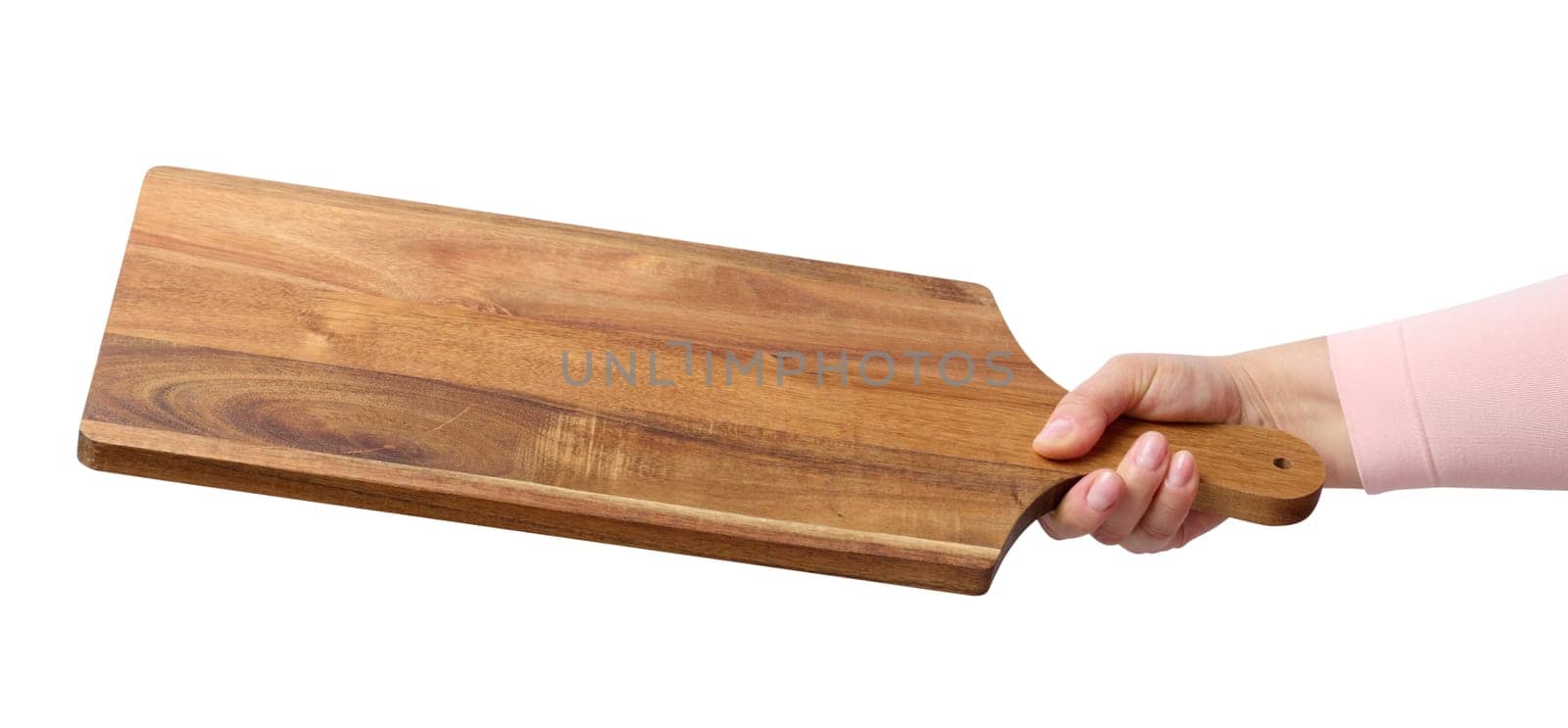Female hand holding a rectangular wooden cutting board kitchen board by ndanko