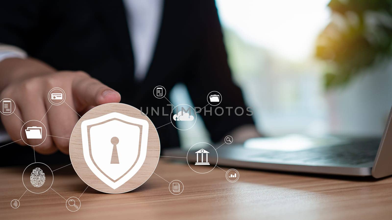 Businesswoman points her finger at a circular wooden plank showing a global network of communication icons. by Unimages2527