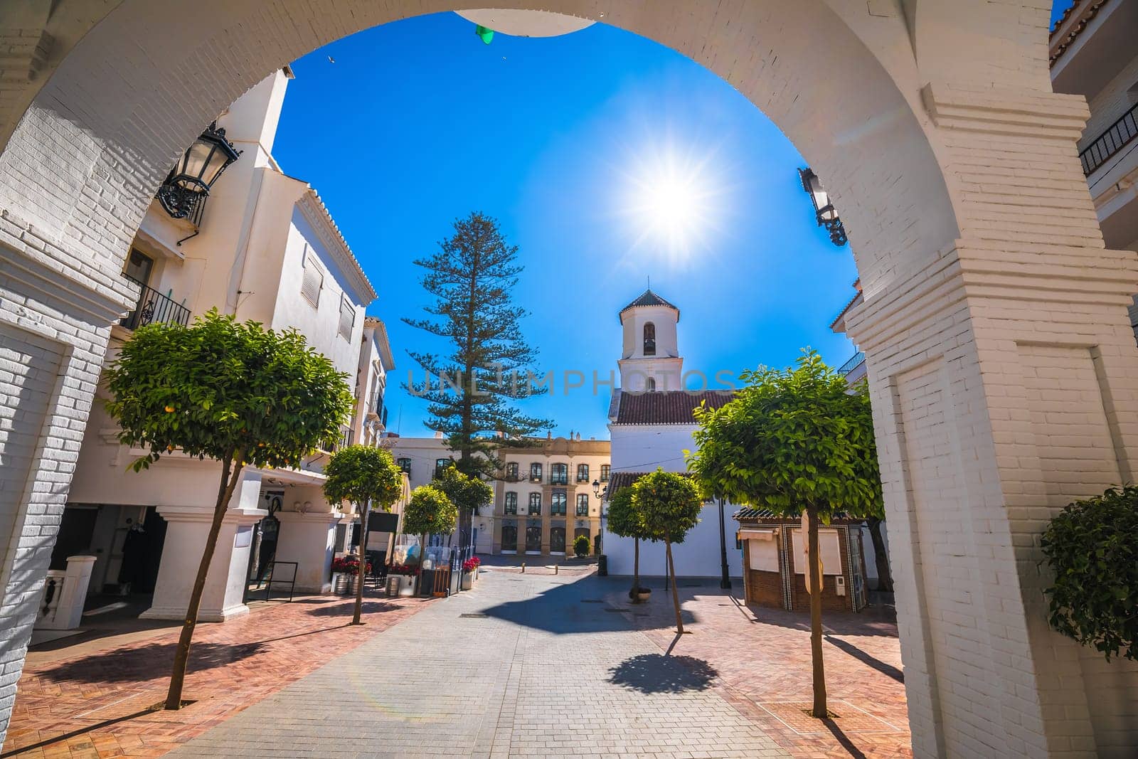 Town of Nerja white colorful street view by xbrchx