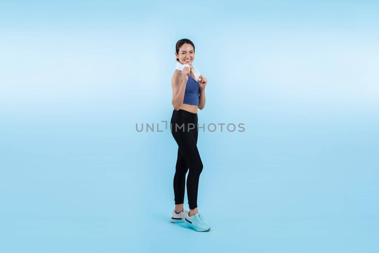 Full body asian woman in sportswear portrait, smiling and posing cheerful gesture. Workout training with attractive girl engage in her pursuit of healthy lifestyle. Isolated background Vigorous