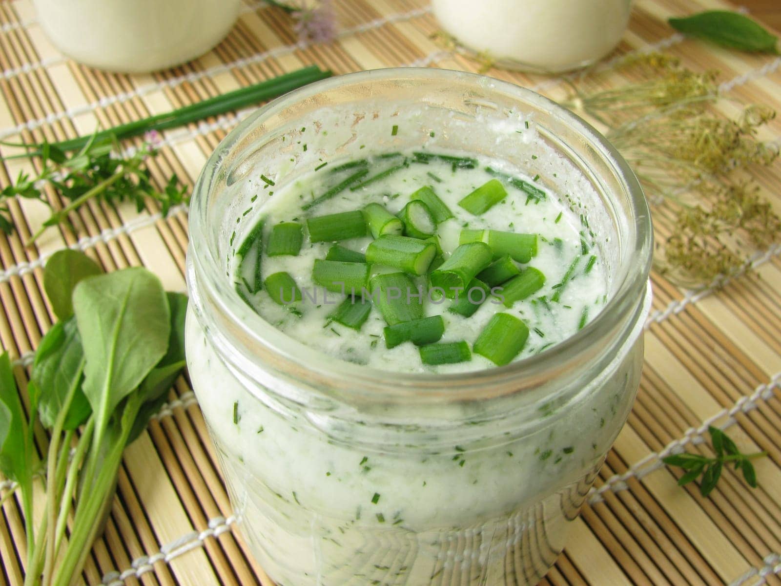 Green yoghurt smoothie with garden herbs
