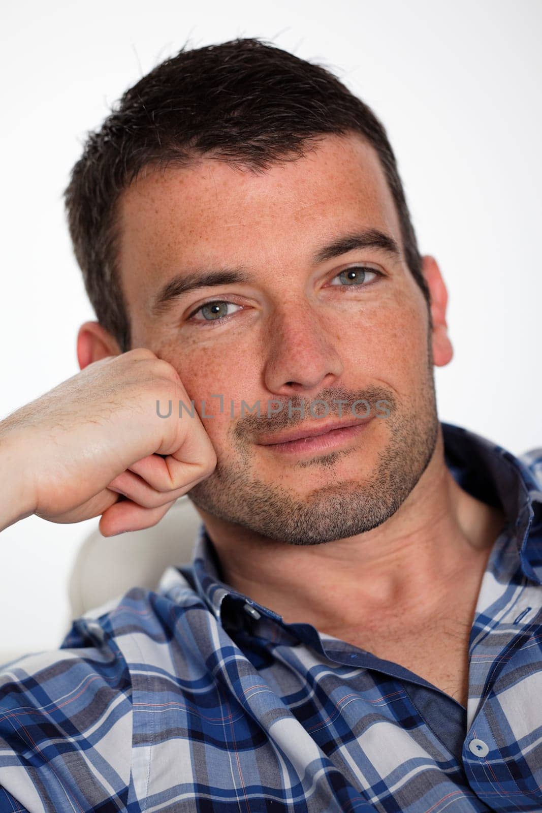 portrait of beautiful young man in studio