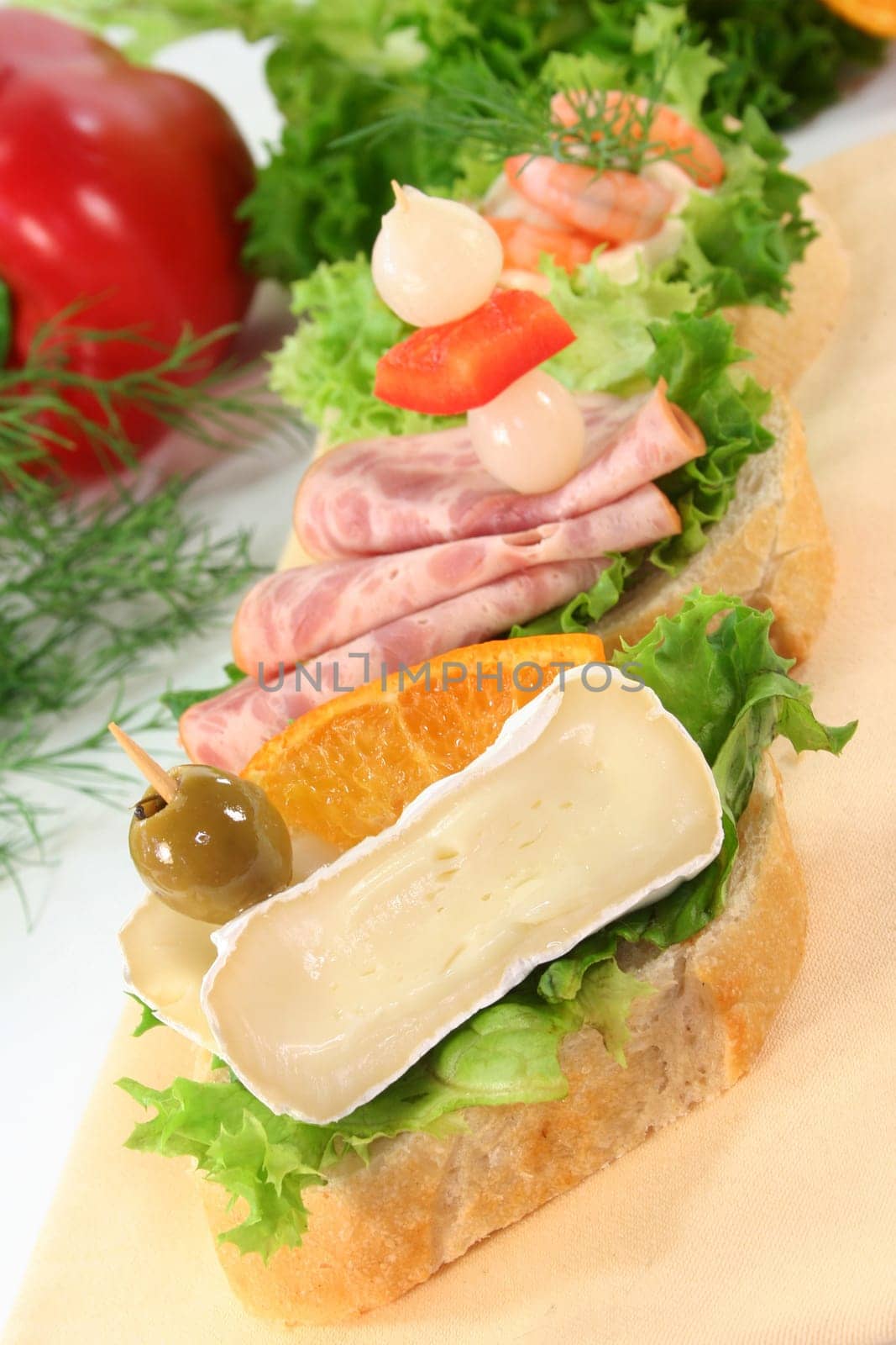 Various colorful canapés on a napkin