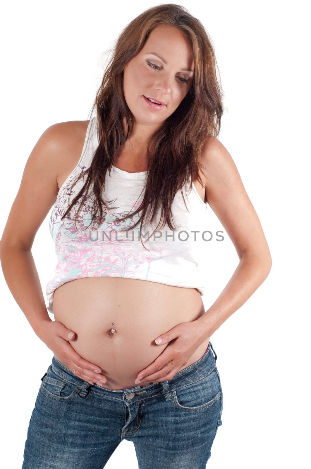 Beautiful pregnant woman in studio isolated on white