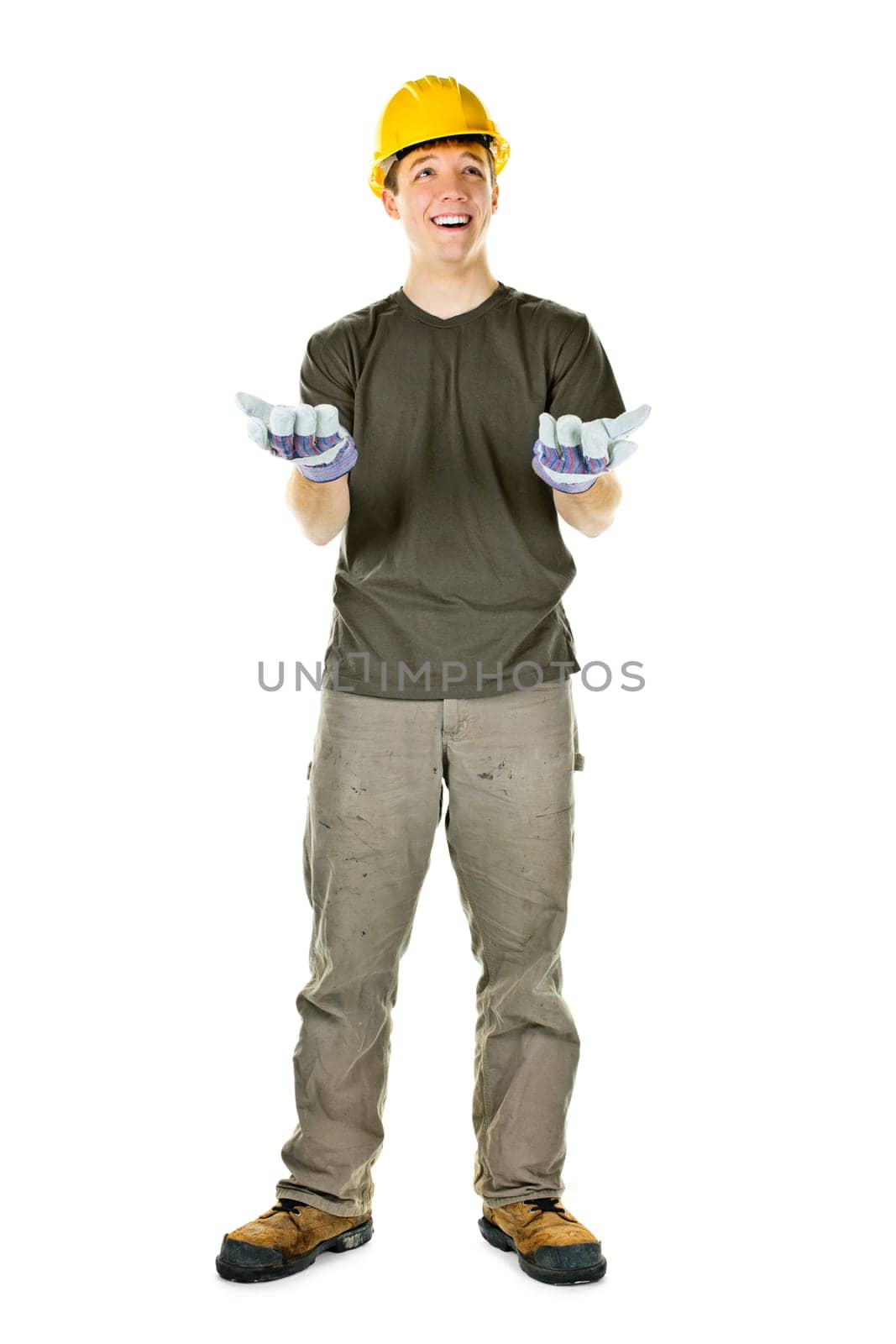 Young construction worker looking up shrugging isolated on white background