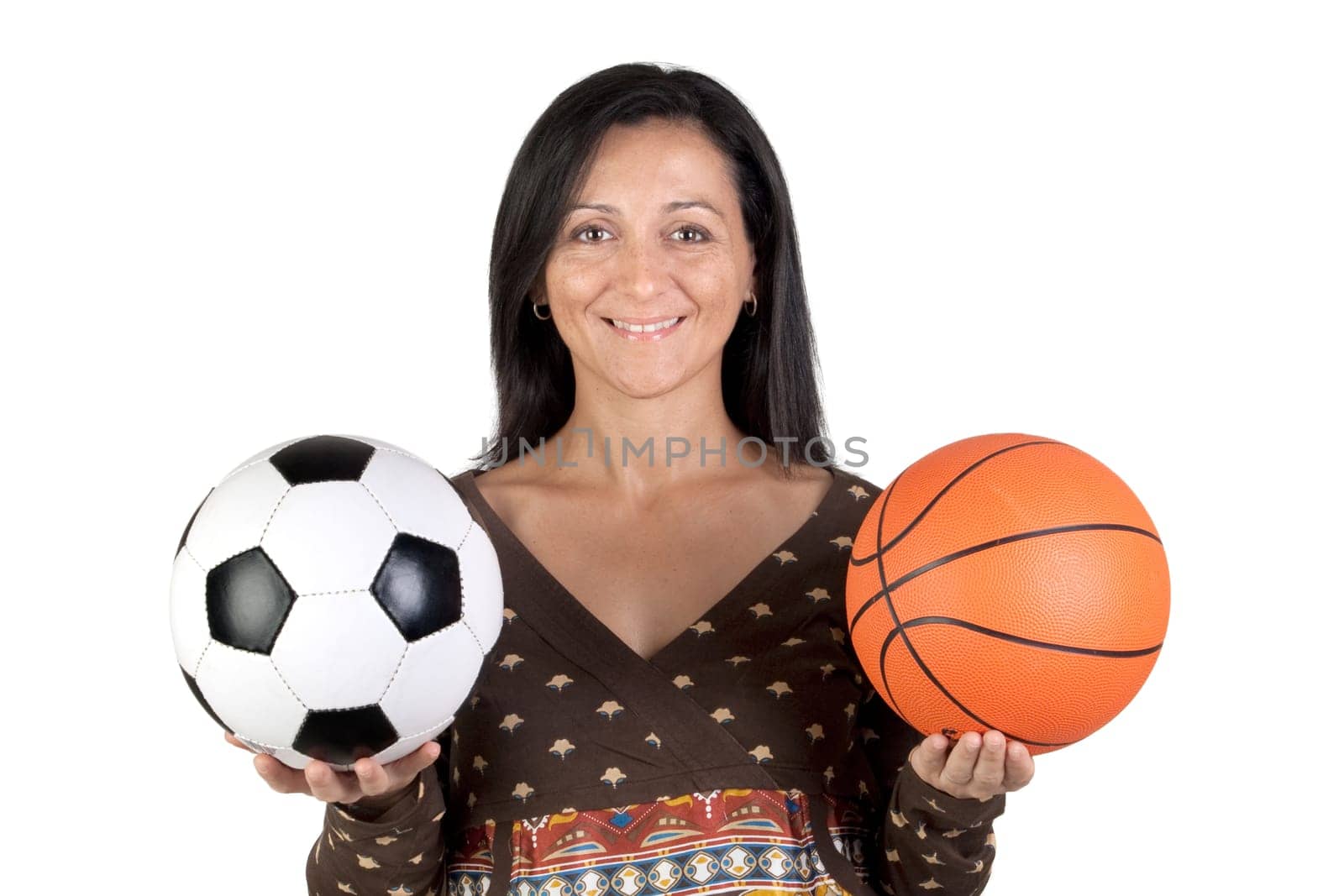 Attractive girl with soccer and basket ball isolated on white background