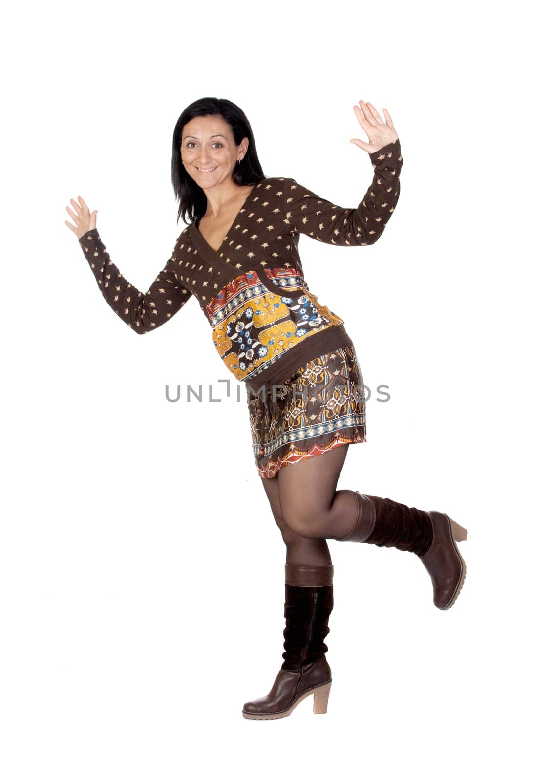 Beautiful brunette girl balancing isolated on white