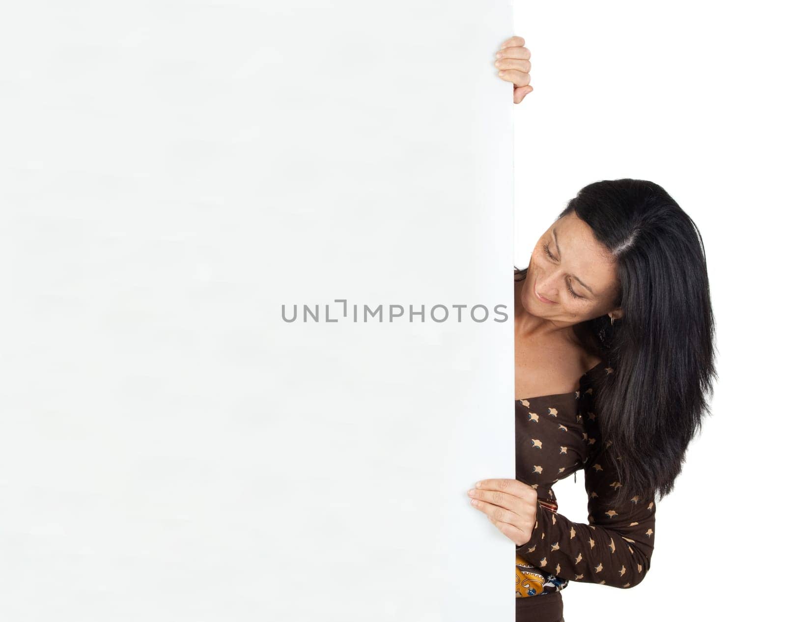 Attractive girl with blank poster isolated on white background