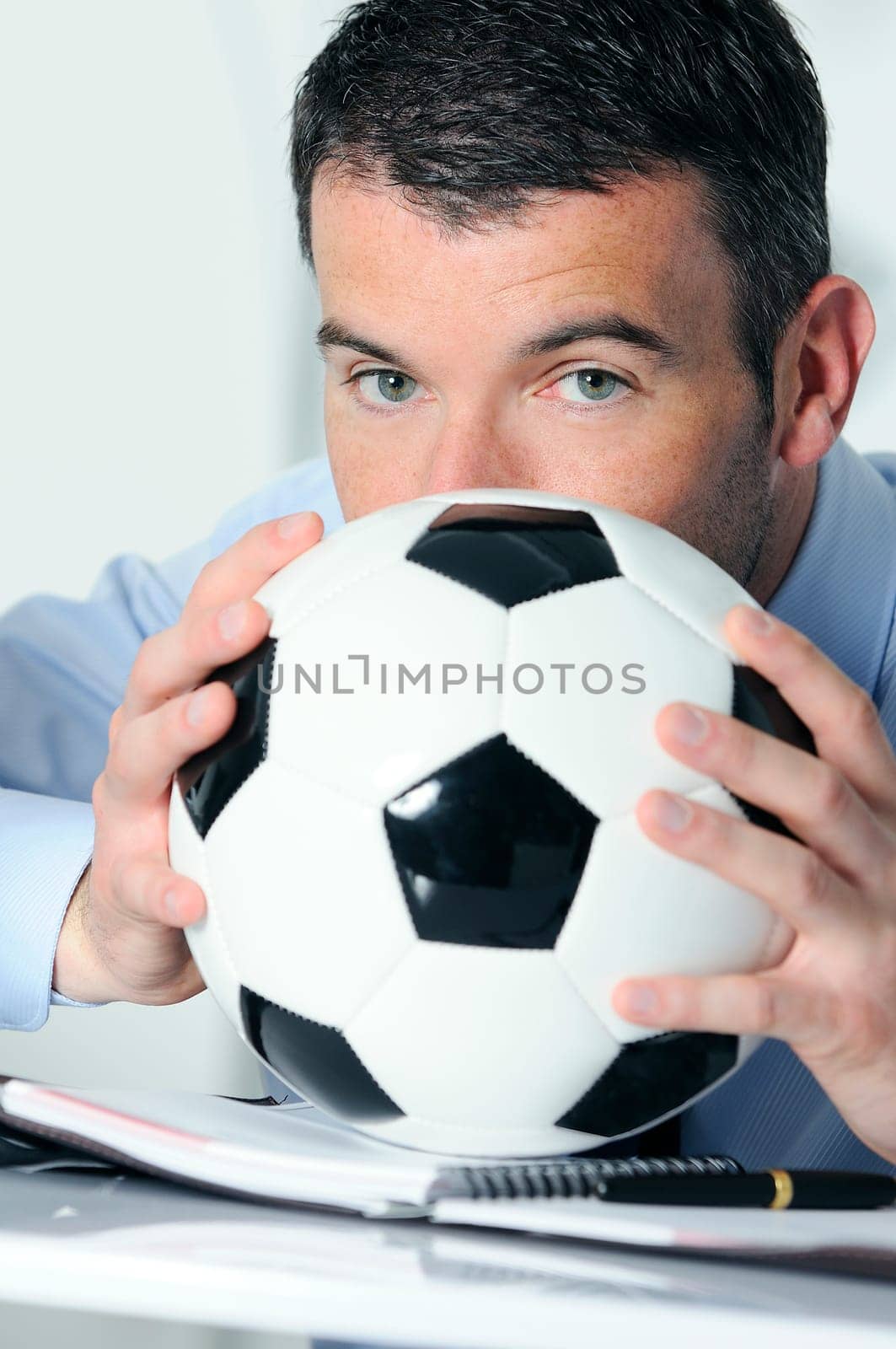 Business man with football