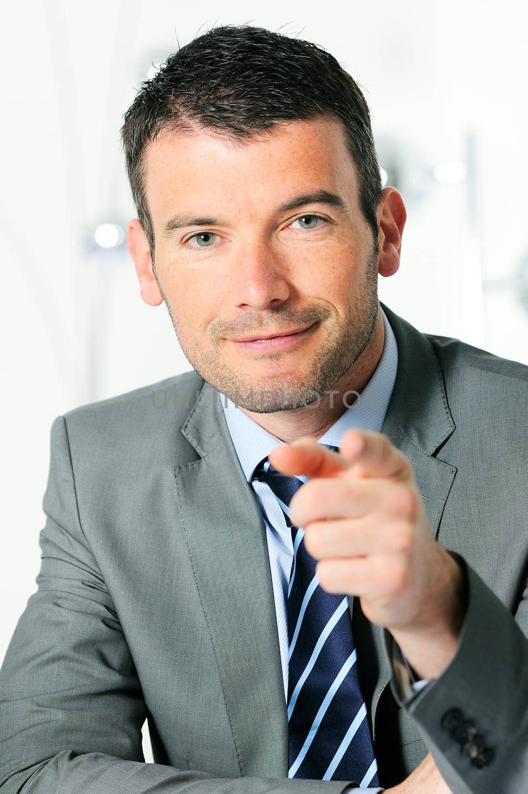 An attractive business man is helping you