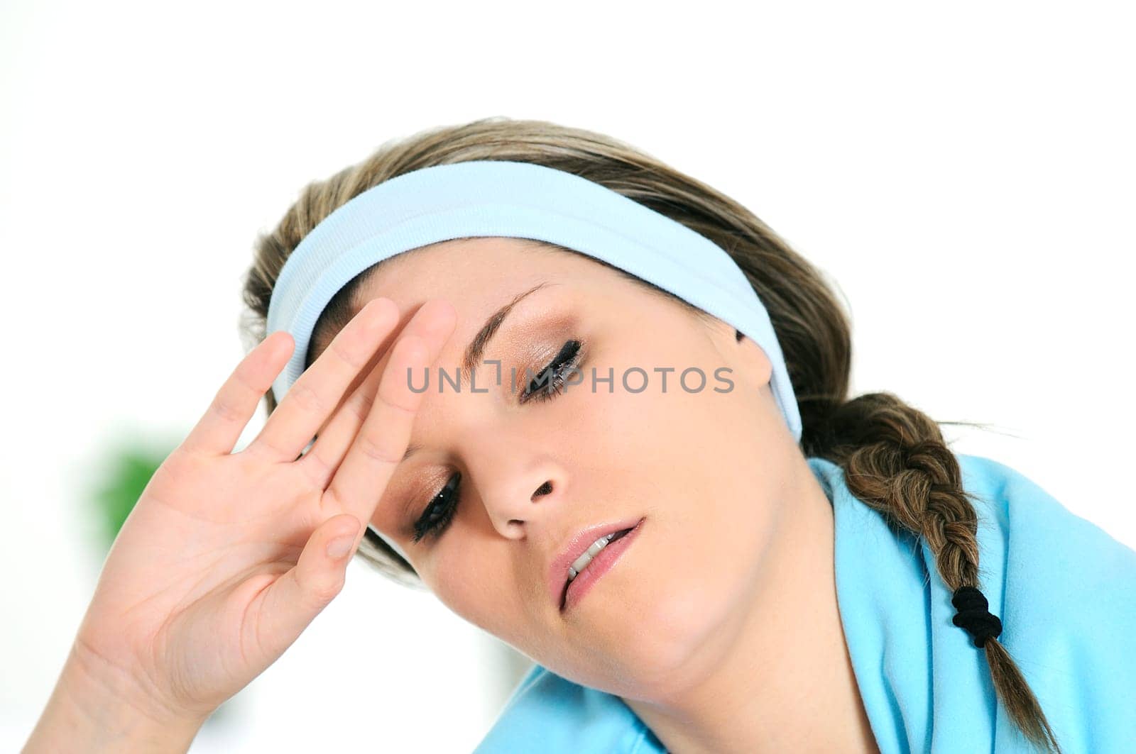 attractive young woman taking a break after sport