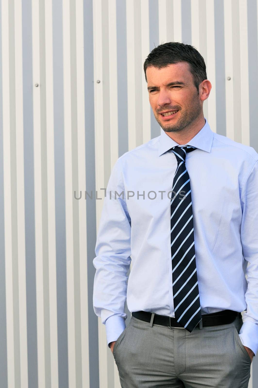 great and serious businessman is having a moment outtdoor