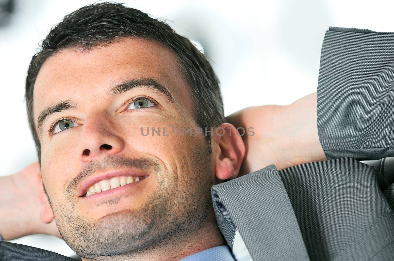 Attractive businessman is taking break from business
