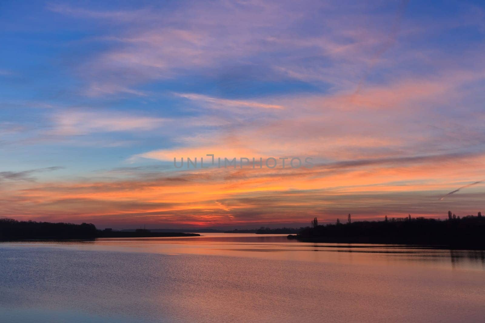 a beautiful sunrise on a big lake