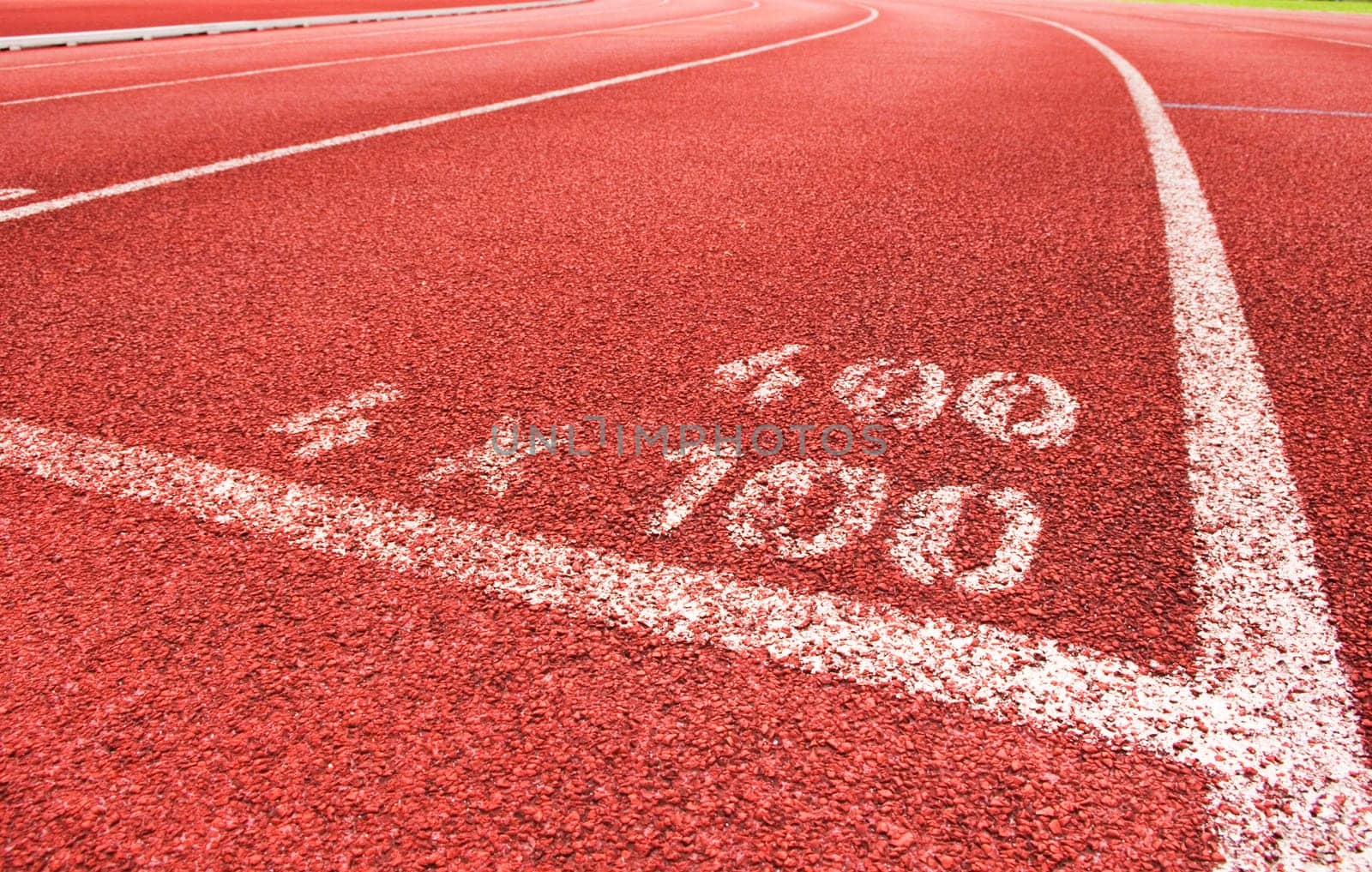 a close up of white line on red racetrack, for sports, concept background.
