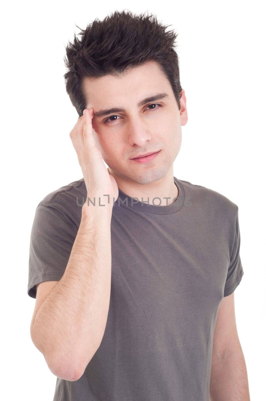 young casual man having headache isolated on white background