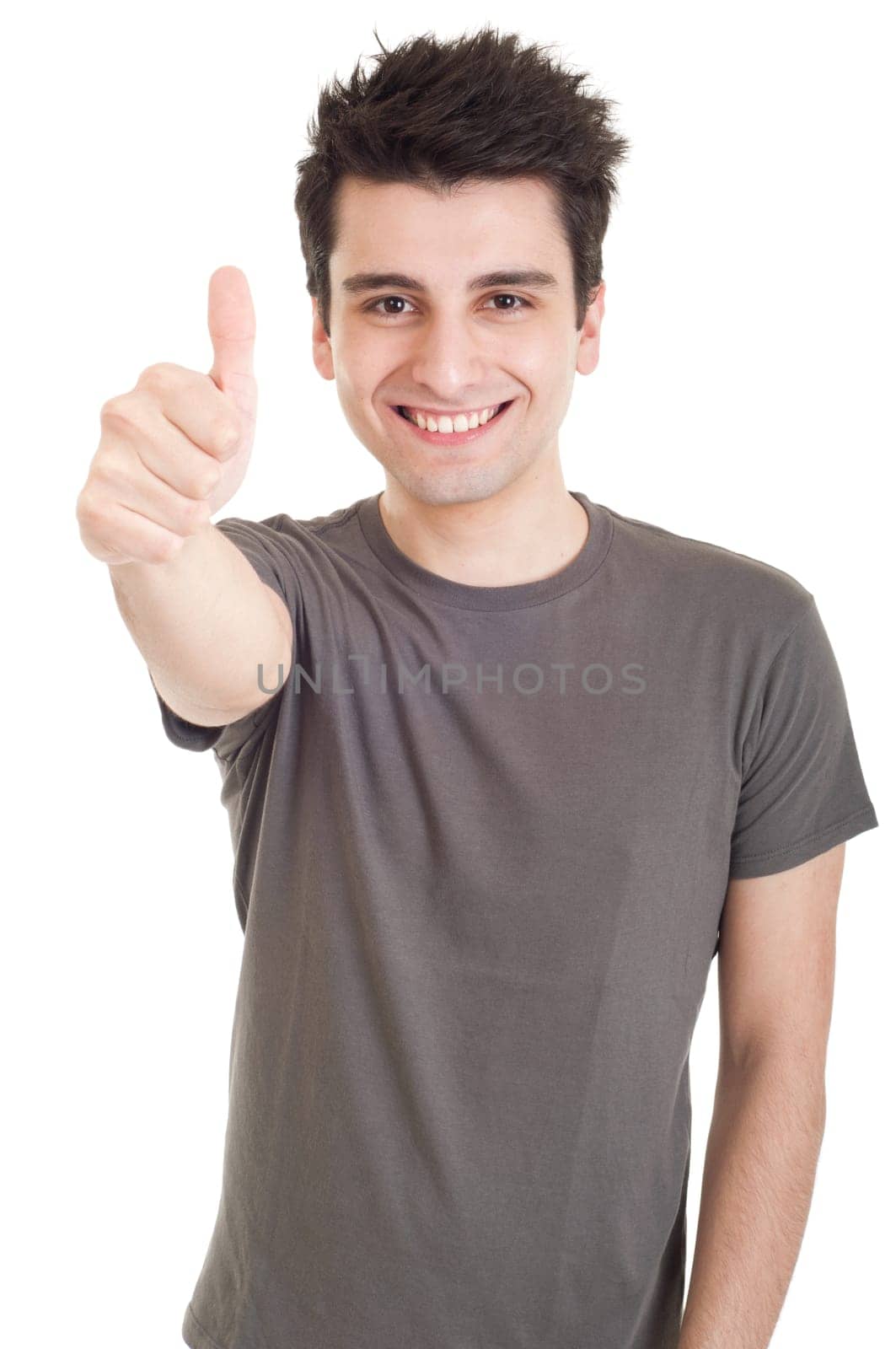 smiling young man with thumbs up (focus on hand) on an isolated white background
