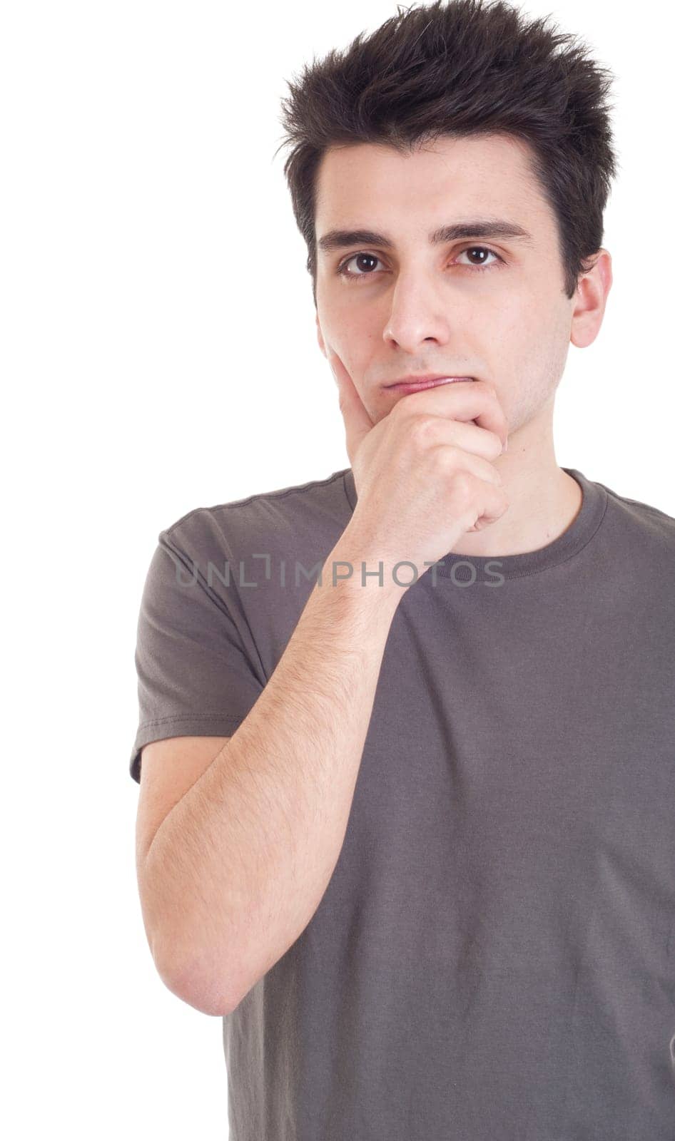 young casual man with a pensive expression isolated on white background