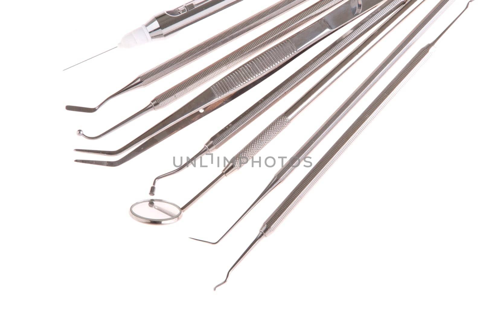 set of stainless steel dental surgery instruments for teeth care (isolated on white background)