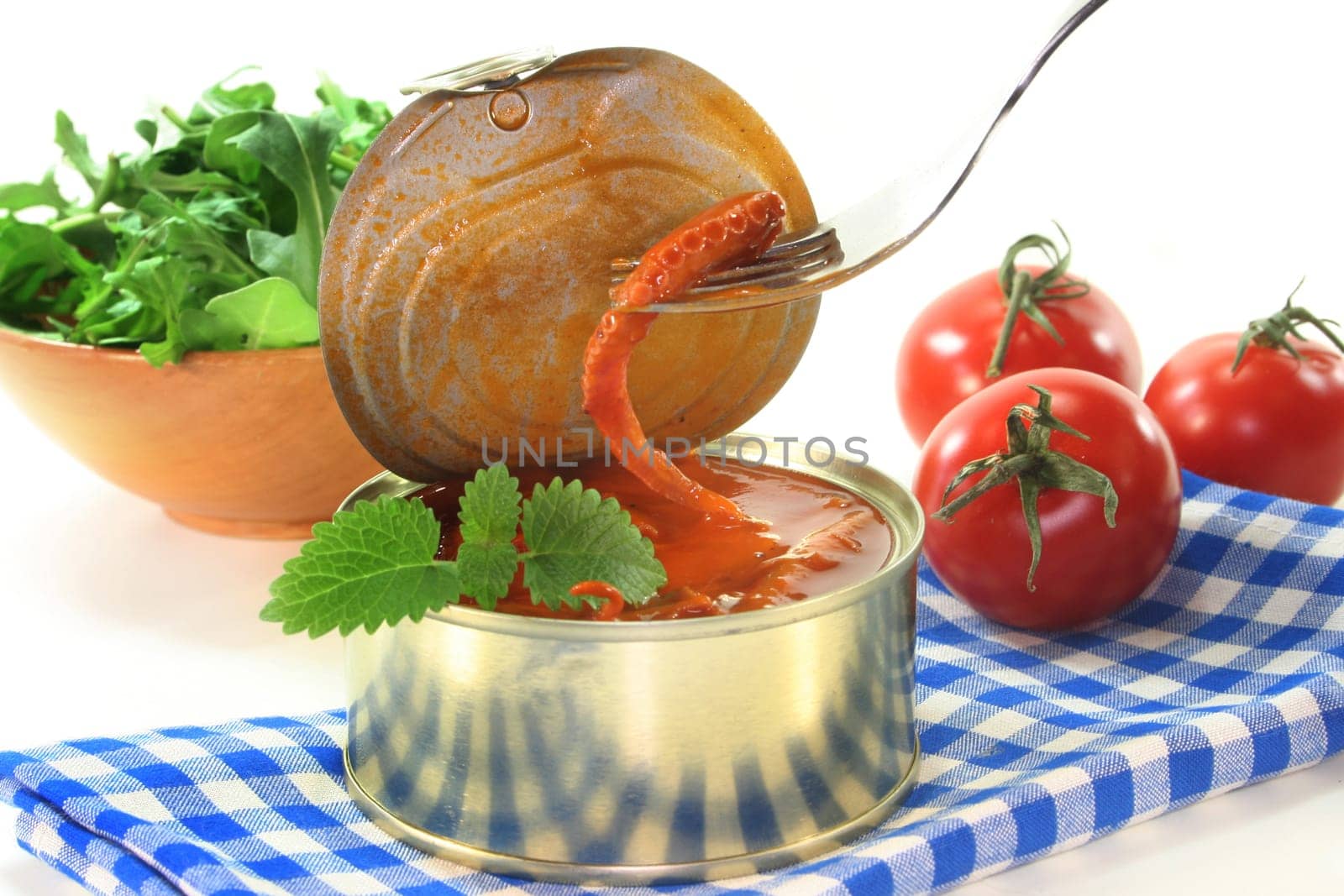 a can of musk octopus in tomato sauce