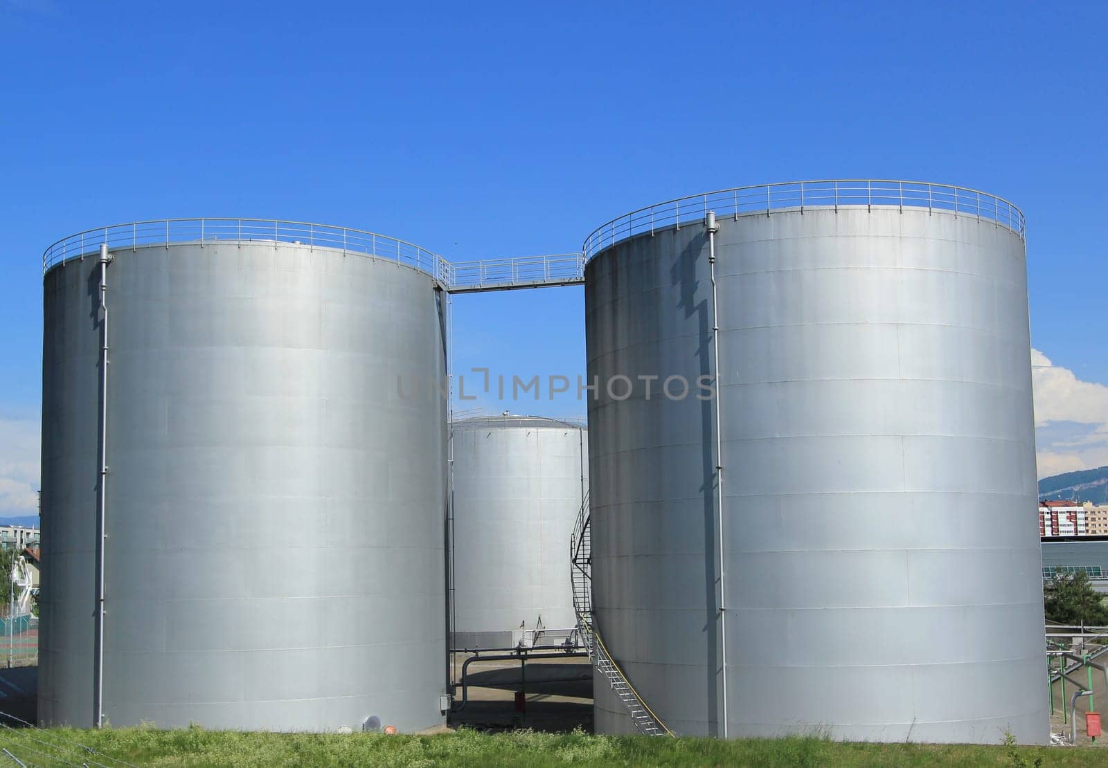 Big grey oil tanks at Vernier, Genva, Switzerland