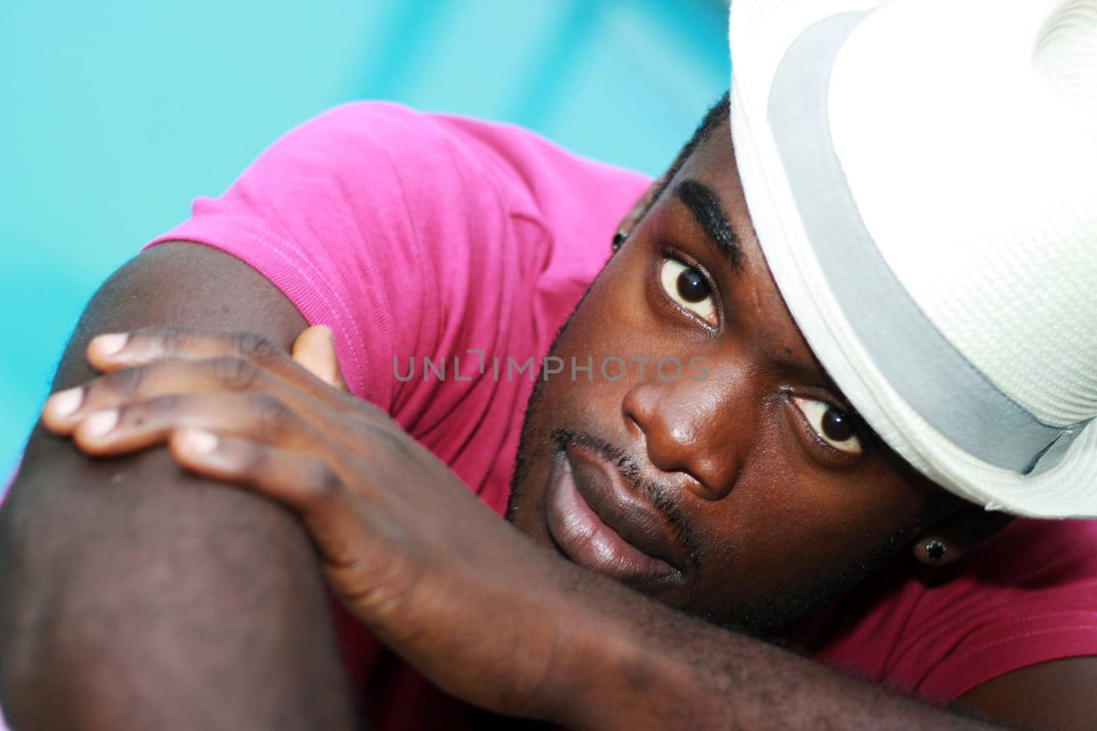 Young african american with hat