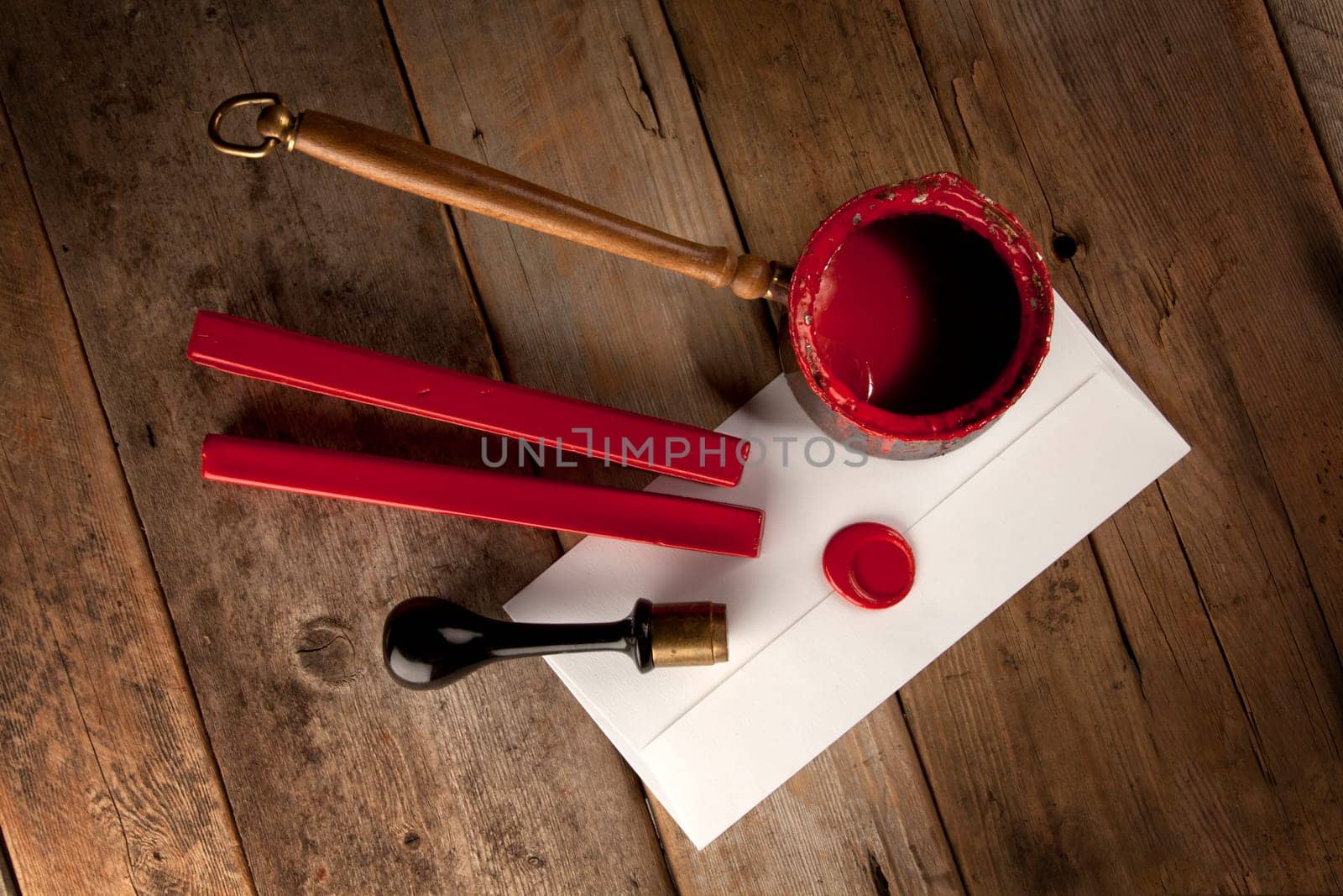Red wax staff with stamp, pot and letter