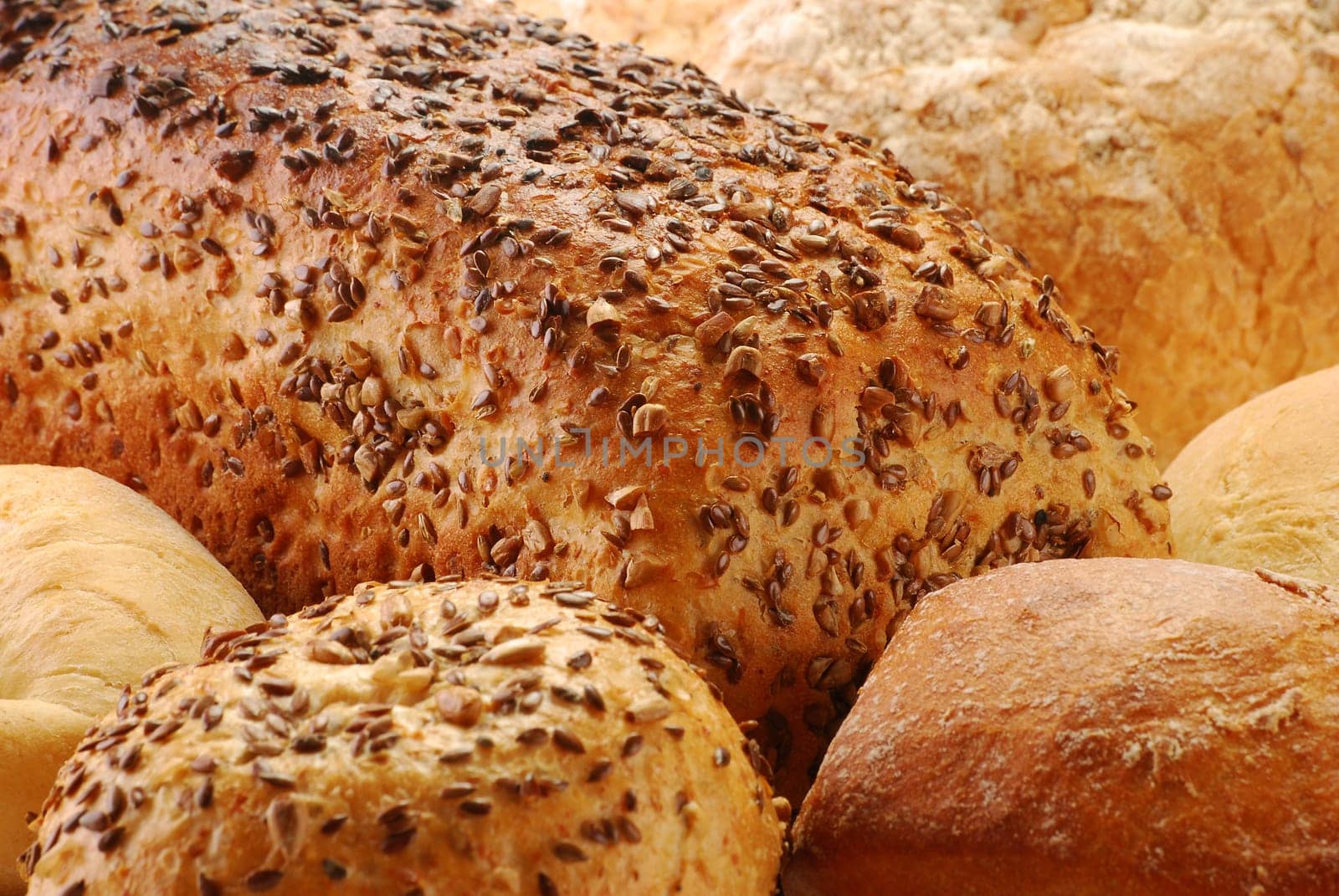 Composition with bread and rolls isolated on white