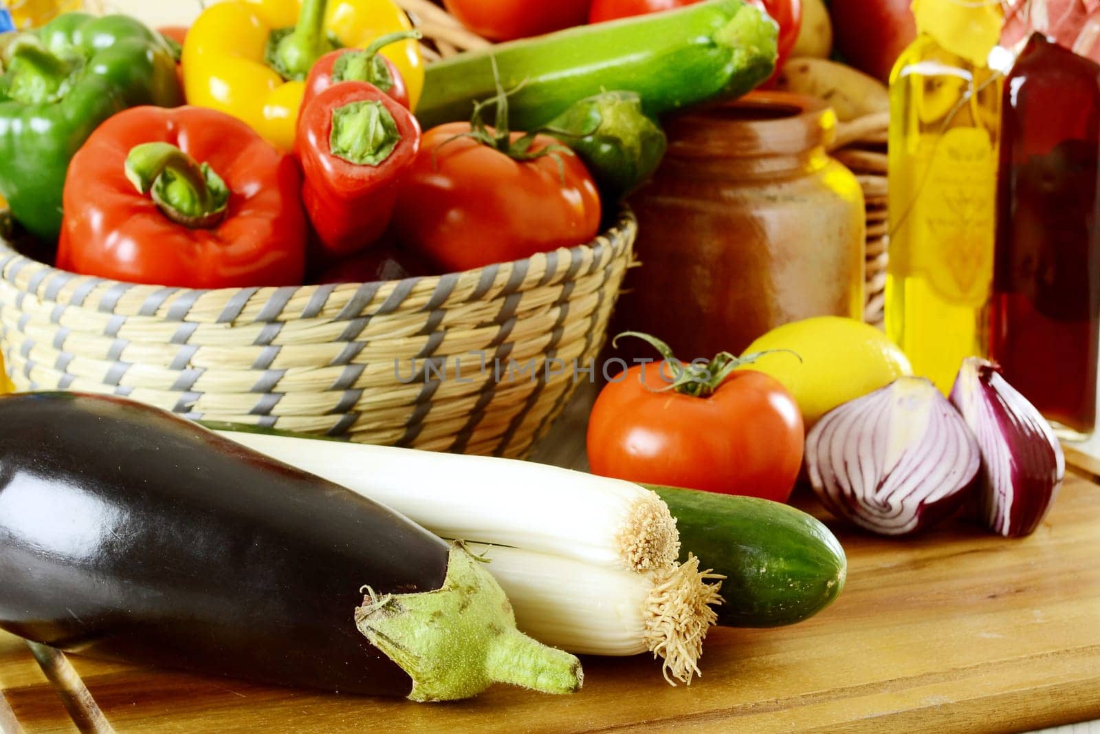 Composition with raw vegetables on kitchen table