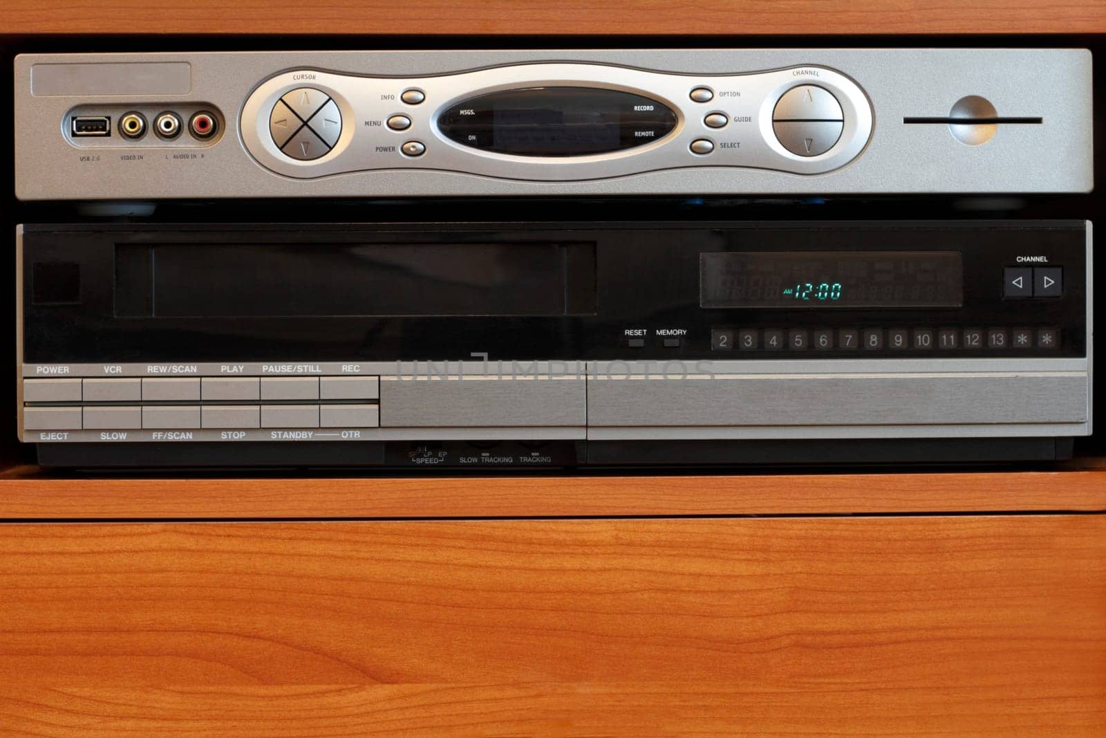 Technology to watch television in modern ways sits on top of an old video player.