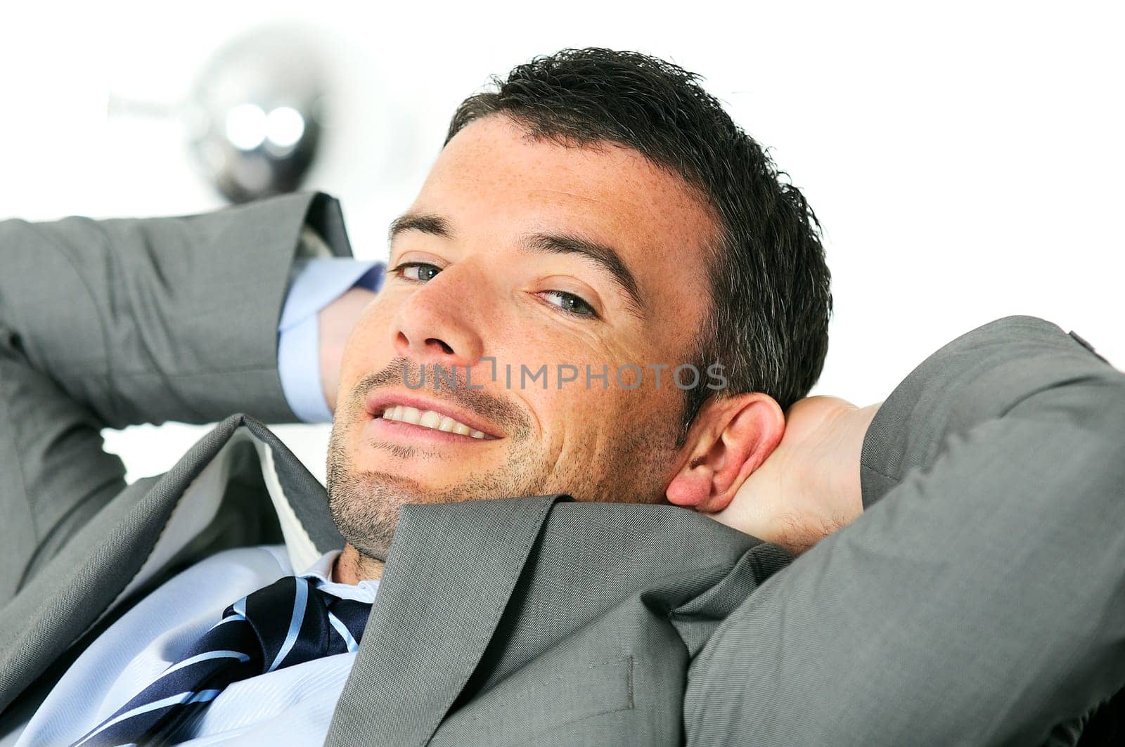 Attractive businessman is taking break from business