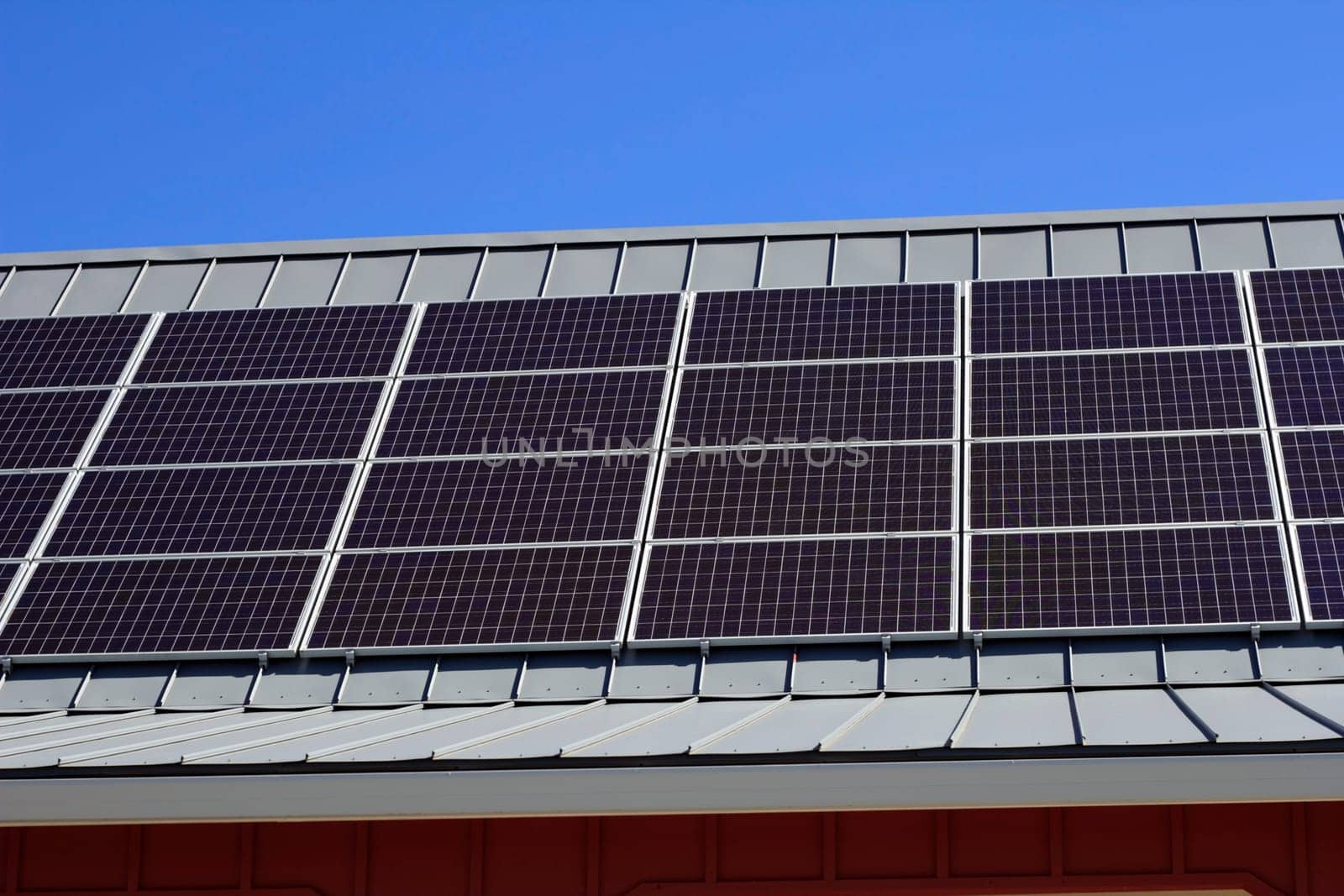 Natural energy from the sun is gathered with an outdoor technology system on a roof.