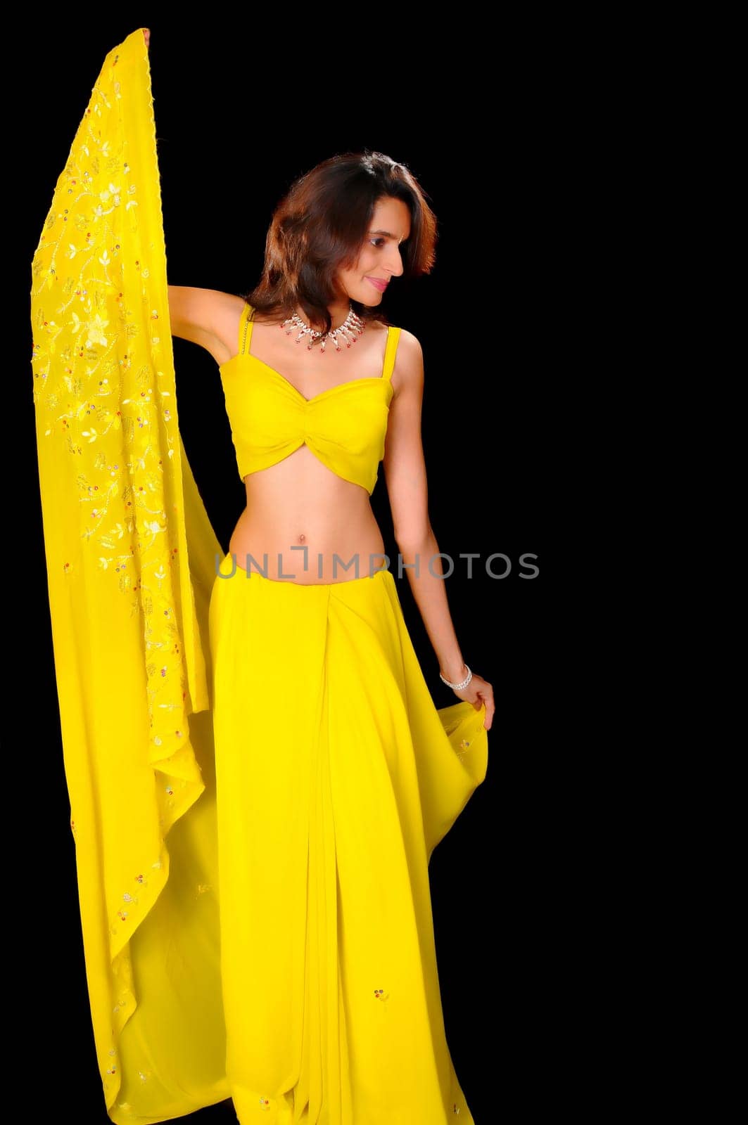 Isolated lovely and sexy young Indian girl
