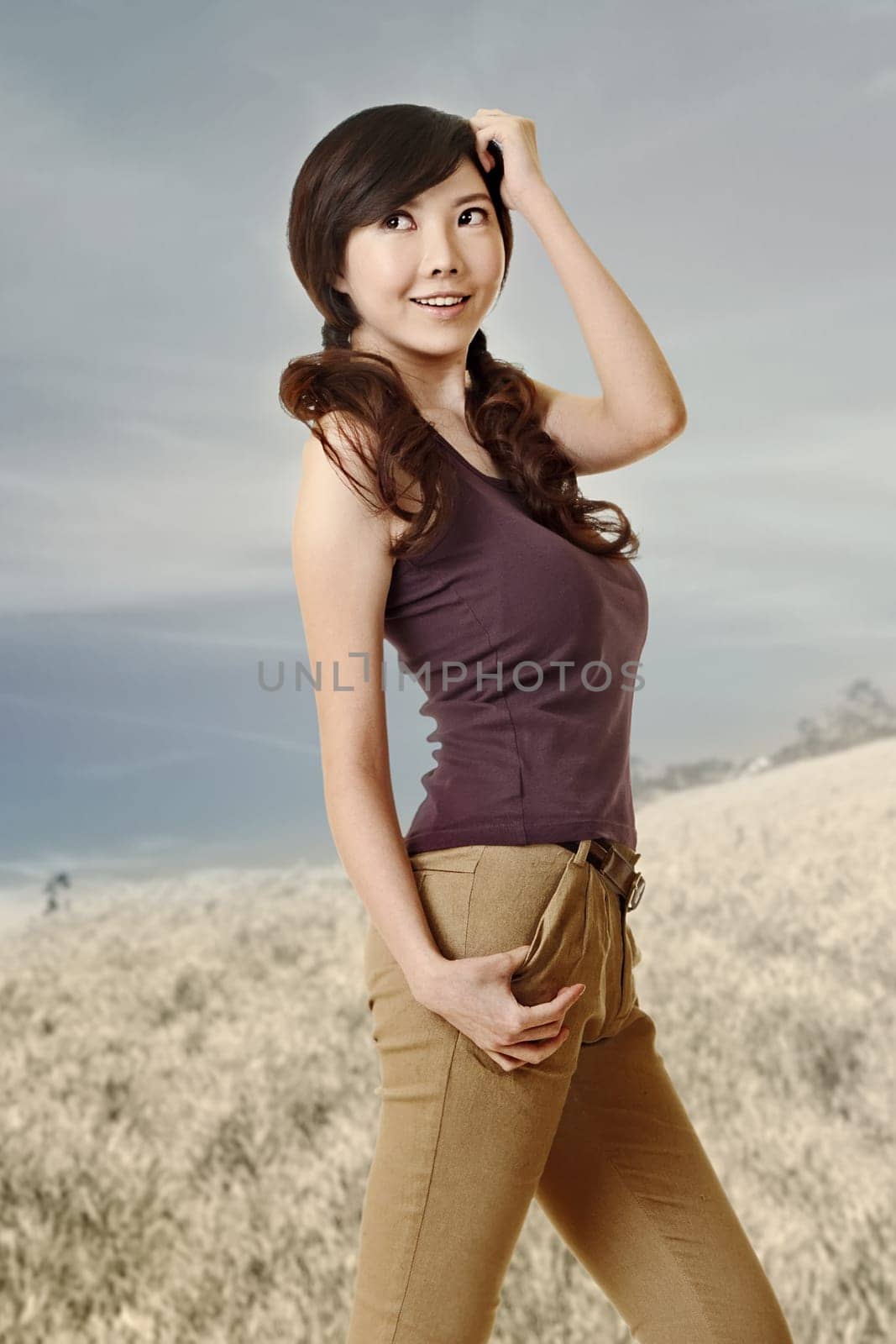 Asian beauty smiling and looking in outdoor in daytime.