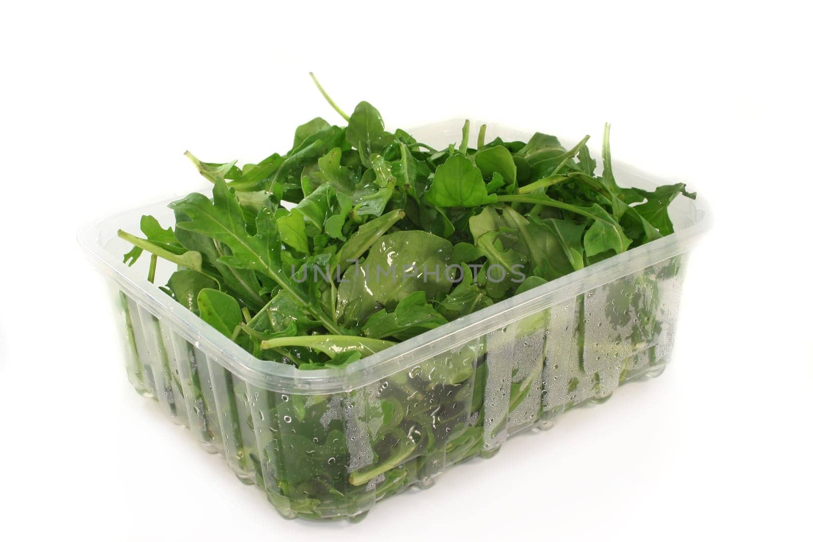 fresh arugula leaves in a bowl