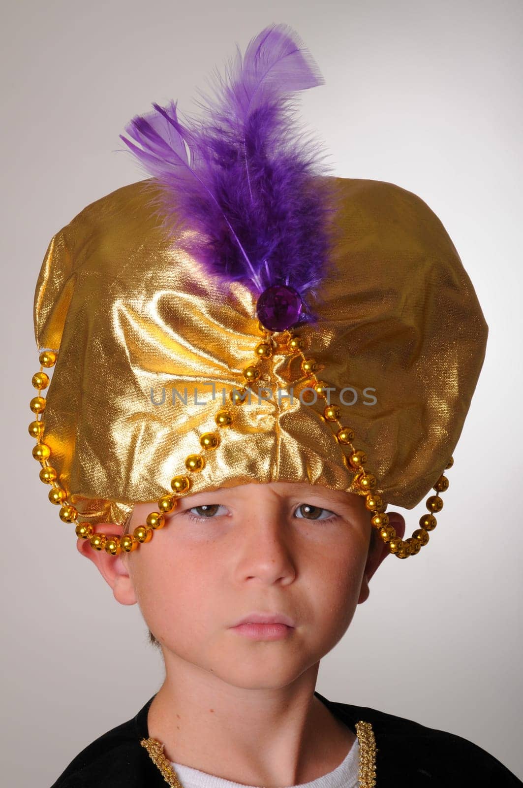 Young boy wearing a Sultan or Shiek&#039 s halloween costume