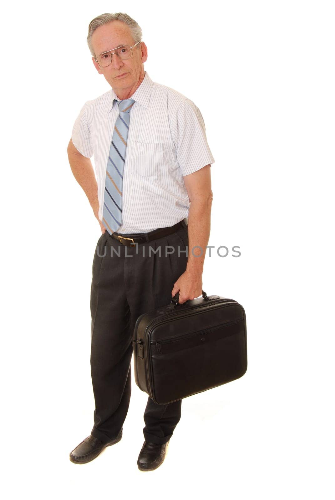 Senior businessman carrying briefcase isolated over white