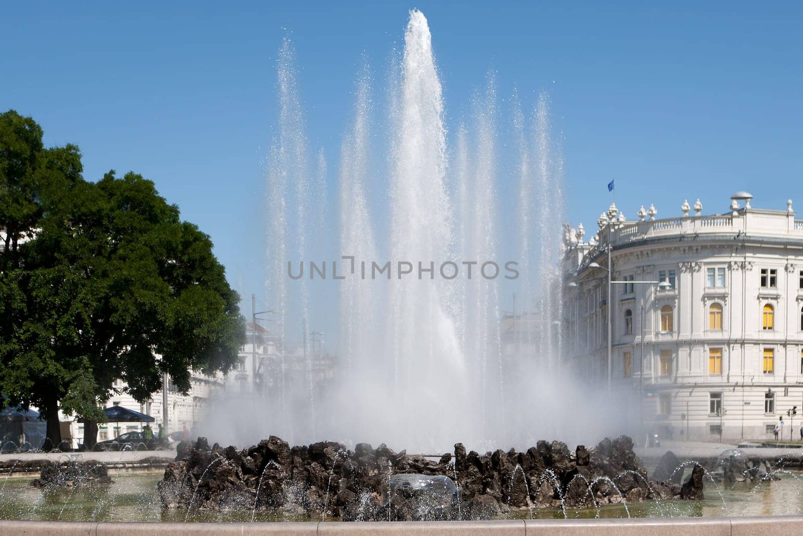 Schwarzenbergplatz,landmark of Vienna with high-jet fountain in the center