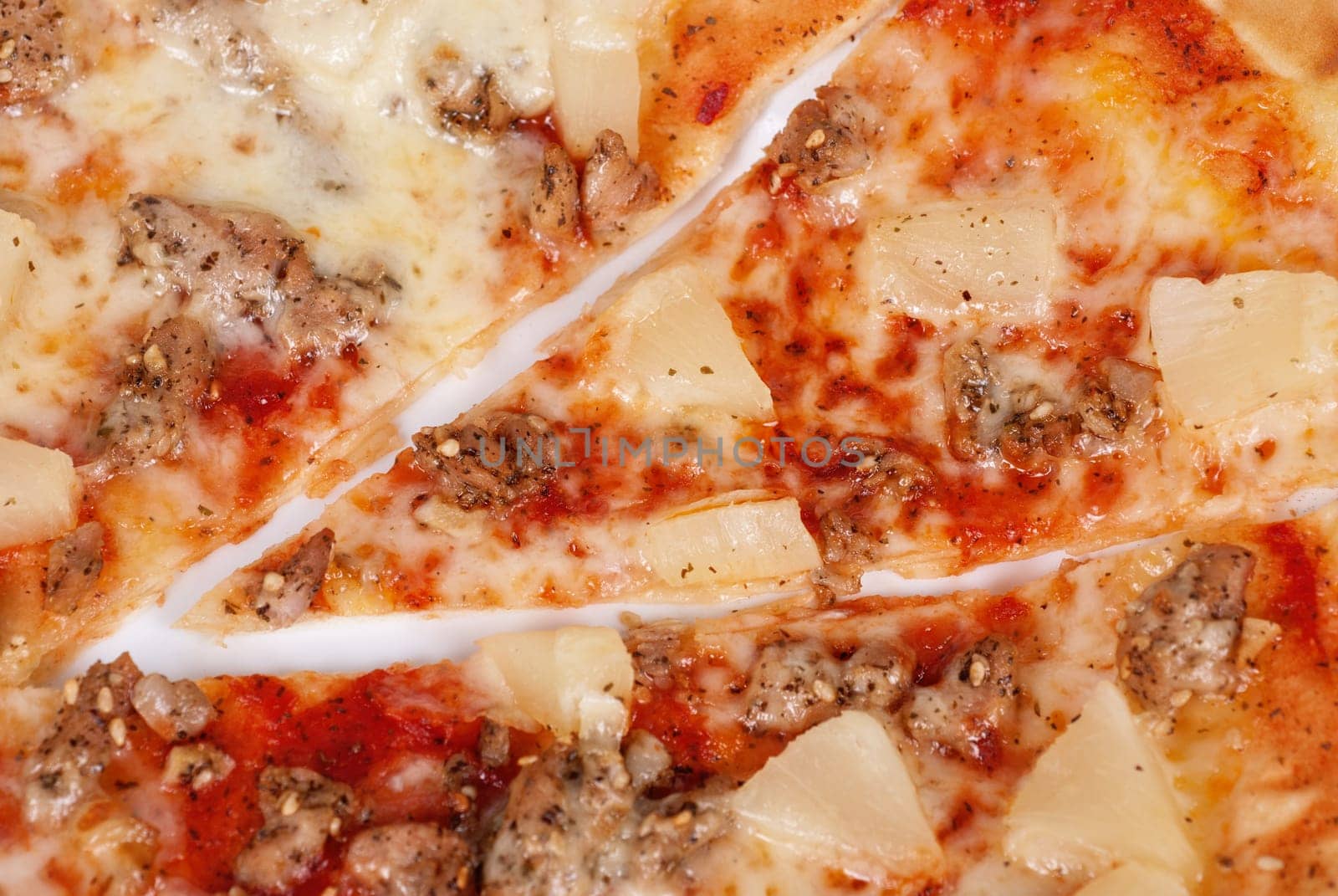 Hawaiian pizza with roasted chicken, pineapple, garlic and mozzarella cheese
