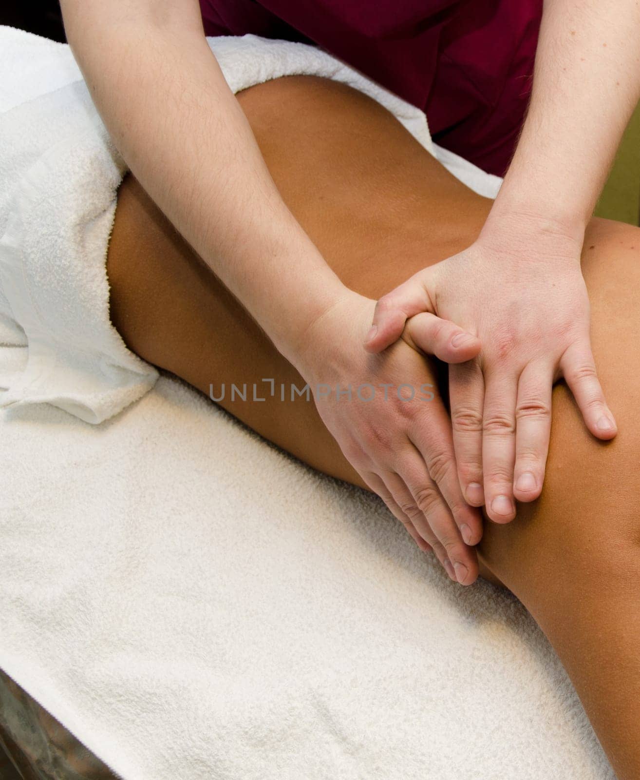 closeup of young woman getting a back massage