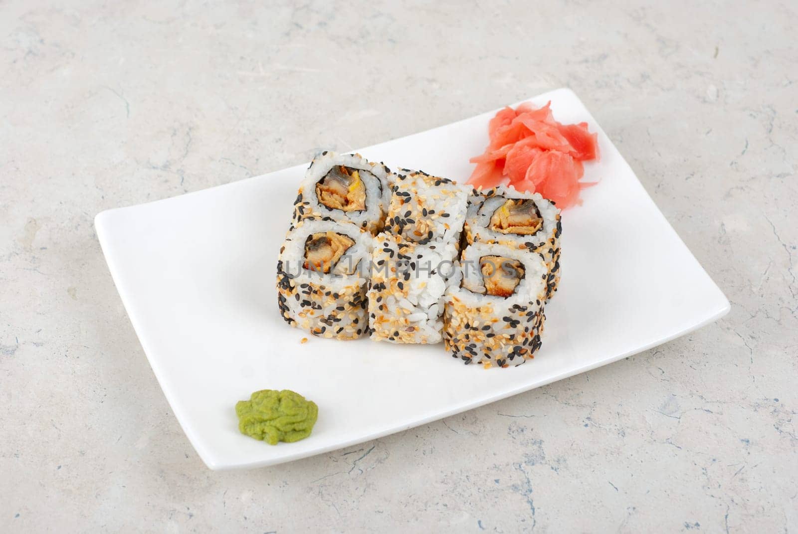Closeup of Sushi rolls at plate with sesame