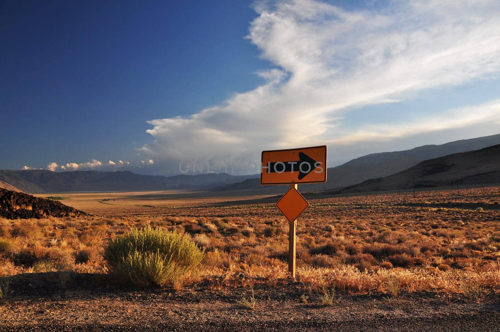 Traffic sign with direction sign on the side of the road,USA
