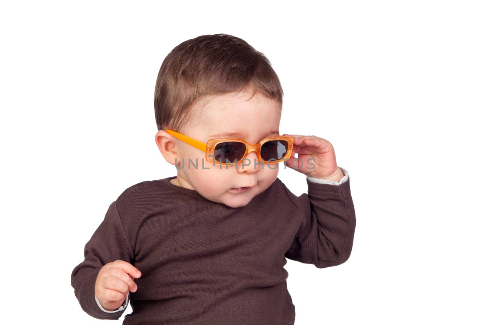 Beautiful baby with sunglasses isolated on white background