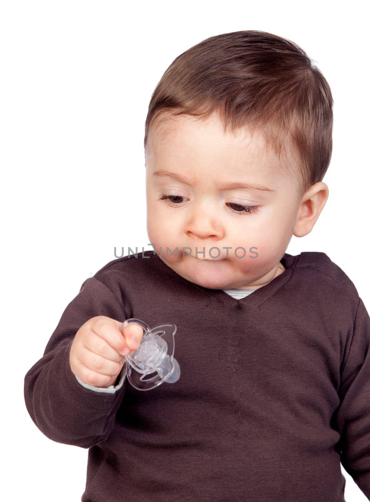 Beautiful baby with a pacifier isolated on white background