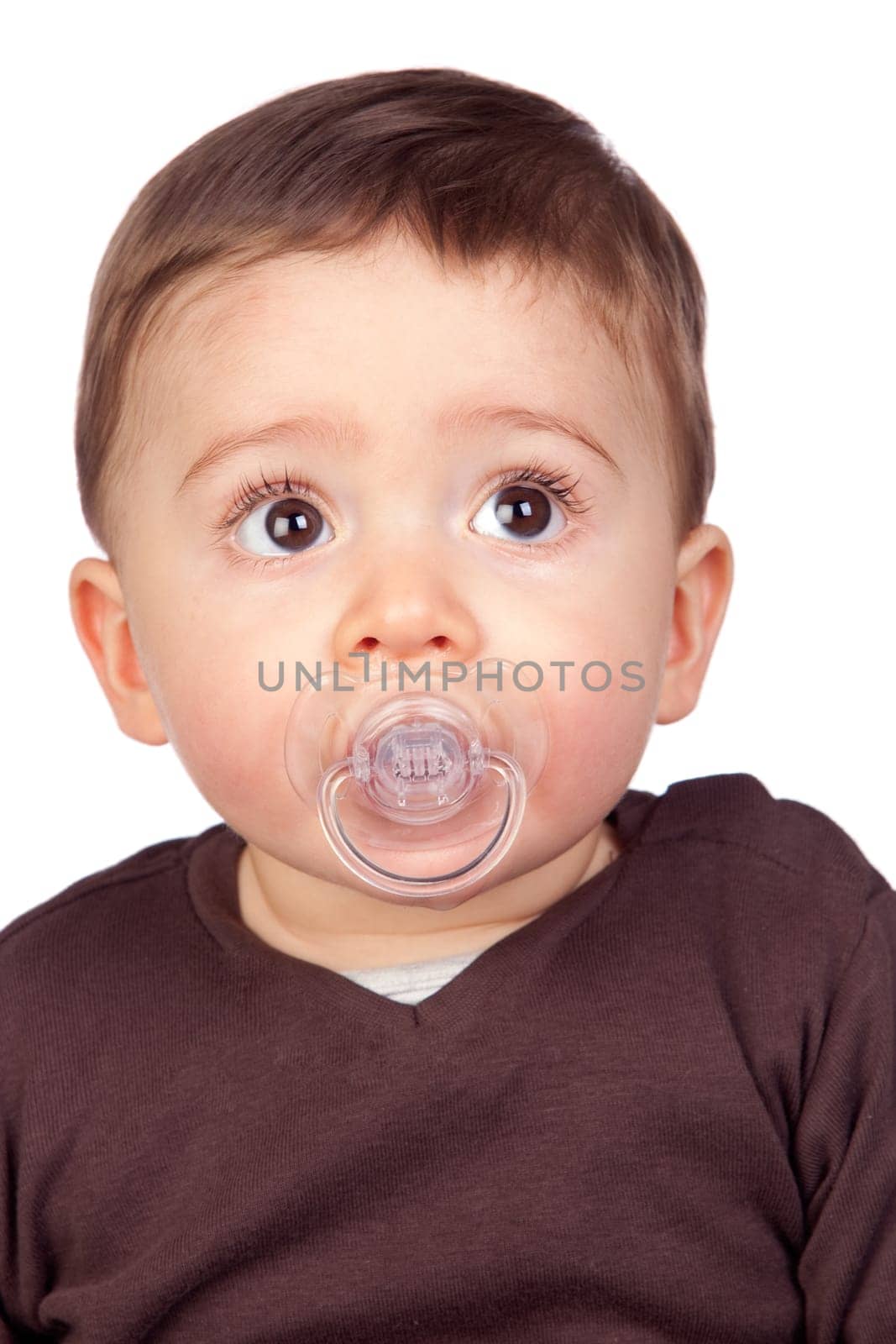 Beautiful baby with a pacifier isolated on white background