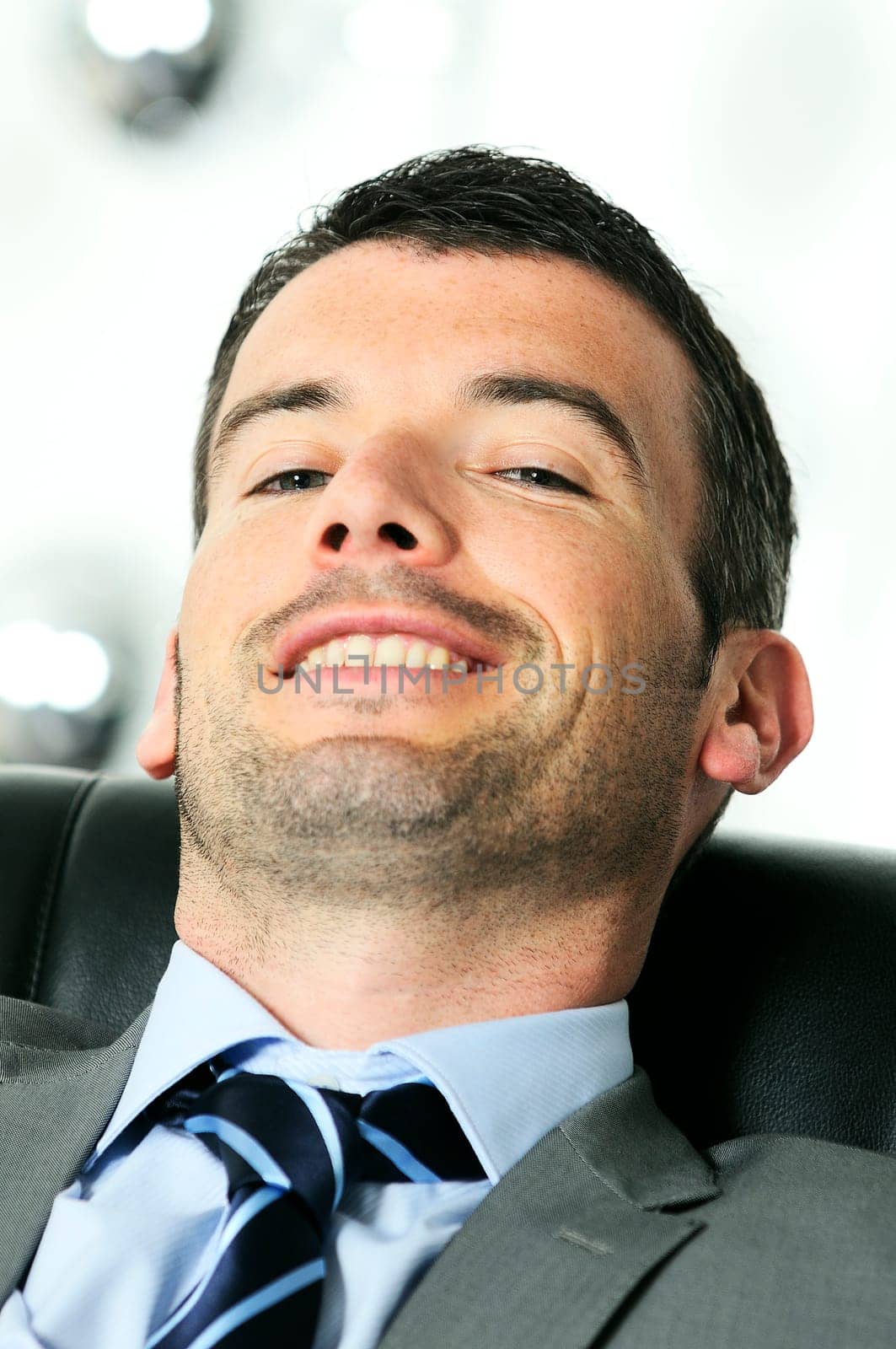 Attractive businessman is taking break from business